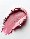 smooth, pink makeup smear with texture on a white surface, showcasing a creamy cosmetic product. Royalty Free Stock Photo