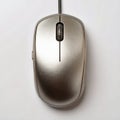 A top-down view of a sleek silver-chrome computer mouse with an attached cord Generated image Royalty Free Stock Photo