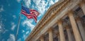 USA Washington DC Capitol detail with waving American flag, blue sky Royalty Free Stock Photo