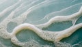 White foam texture on water close up background. Soapy substance with bubbles backdrop