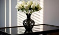 White Roses in a Black Lace Vase on a Glass Table. Elegant Simplicity Royalty Free Stock Photo