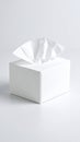 White tissue box with pulled tissue against a clean, neutral background Royalty Free Stock Photo