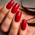 Generated imageClose-up of hands with bold red manicure. Glossy, elegant, and stylish nails. Royalty Free Stock Photo