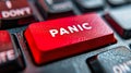 Close-up of a red PANIC button on a keyboard, symbolizing urgent distress calls, emergency response, and immediate action Royalty Free Stock Photo