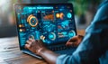Professional Analyzing Sales Performance Metrics Using a Digital Interface with Graphs and Data Icons on a Laptop