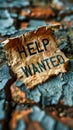 Simple HELP WANTED notice on a torn piece of paper, symbolizing job vacancy, employment opportunities, and the search for new Royalty Free Stock Photo