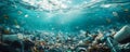 Underwater view of ocean pollution with plastic waste and discarded trash affecting marine life, highlighting the Royalty Free Stock Photo