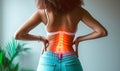 Woman in casual clothes suffering from chronic lower back pain, highlighted area showing lumbar spine and intestines, concept Royalty Free Stock Photo