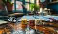 Wooden blocks spelling SMA, short for Spinal Muscular Atrophy, on a doctors desk with stethoscope and clipboard in the