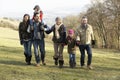 3 Generation family on country walk in winter Royalty Free Stock Photo