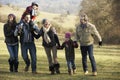 3 Generation family on country walk in winter Royalty Free Stock Photo