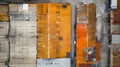 Generative AI Aerial view of a factory and its warehouses with yellow walls and an orange roof. The industrial are Royalty Free Stock Photo