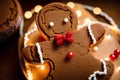 Christmas gingerbread cookies with icing sugar on the background of the Christmas tree. gingerbread man. Generative AI Royalty Free Stock Photo