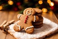 Christmas gingerbread cookies with icing sugar on the background of the Christmas tree. gingerbread man. Generative AI Royalty Free Stock Photo