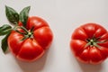 Red tomatoes with green leaves on a white background. Close-up. Healthy food concept. Generative AI Royalty Free Stock Photo