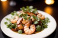 Shrimps with parsley and lemon on a white plate. Generative AI Royalty Free Stock Photo