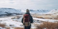 Generative AI, backpacker in winter landscape, traveler man tourist