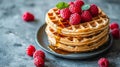 Generative AI Belgian waffles with maple syrup and fresh raspberry Grey background business concept. Royalty Free Stock Photo