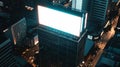 Generative AI Blank white billboard on the top of building at night city background mock up business concept. Royalty Free Stock Photo