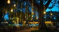 Generative AI Blur image of outdoor park restaurant with light up decoration on trees at night business concept. Royalty Free Stock Photo