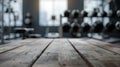 Generative AI Blurred background of fitness gym and wooden table free space for product display business concept. Royalty Free Stock Photo