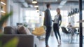 Generative AI Blurred office interior space with businessman and businesswoman meeting background with copy space Royalty Free Stock Photo