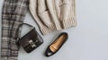 Generative AI Brown pants in check beige knitted oversize sweater cross body bag black loafers or flat shoes on gr