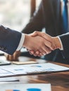 Generative AI Businessmen Shaking Hands Over Contract Agreement in Office Setting business concept.