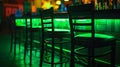 Generative AI Chairs in row in bar with green lights business concept. Royalty Free Stock Photo