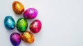 Generative AI Chocolate easter eggs wrapped in foil Colorful rainbow candy isolated on white background Holiday an