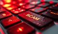 Close-up of a bright red \'SCAM\' alert button on a computer keyboard, symbolizing the importance of cybersecurity and Royalty Free Stock Photo