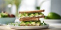 Close up of sandwiches with avocado in kitchen at home, copy space 3
