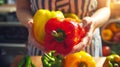 Generative AI Closeup cut bell pepper in female hands in the kitchen business concept. Royalty Free Stock Photo