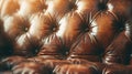 Generative AI Closeup of an elegant vintage Chesterfield pattern brown leather sofa with seat and cushions busines Royalty Free Stock Photo