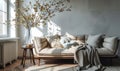 Cozy Modern Living Room with Comfortable Sofa, Soft Cushions, Elegant Throw, Wooden Side Table and Dried Flowers in Bright Royalty Free Stock Photo