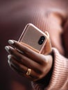 Generative AI Cropped shot of black females hands holding mobile phone with blank copy space screen for your text Royalty Free Stock Photo