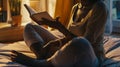 Generative AI Cropped shot of dark skinned woman sits crossed legs wears pyjamas makes notes in diary focused asid
