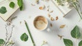 Generative AI Cup of coffee with milk sketchbook pencil green leaves and dried flowers Overhead view Isolated on w Royalty Free Stock Photo