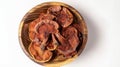 Generative AI Dry Ganioderma Lucidum mushroom Ling Zhi Lingzhi Reishi in wooden bowl isolated on white background