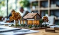 Eco-friendly living conceptualized with a 3D model house on a meeting table in a real estate agency, symbolizing sustainable