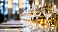Generative AI Elegant Table Setting with Sparkling Glassware and Warm Ambient Lighting business concept. Royalty Free Stock Photo