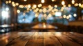 Generative AI Empty wooden table in front of blurred cafe bar or restaurant Abstract lights bokeh background front Royalty Free Stock Photo