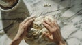 Generative AI Female hands folding and kneading the dough on a marble kitchen counter for baking rustic sourdough