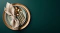 Generative AI Festive place setting with beige napkin. Empty plates and gold cutlery on dark green background. Top Royalty Free Stock Photo