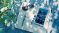 Generative AI Flat lay photography with smart phone earphone notebook and pen camera sunglasses and garden tree bu