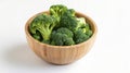 Generative AI fresh broccoli in wooden bowl isolated on white background closeup with full depth of field Top view Royalty Free Stock Photo