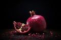 Generative AI, Fresh Juicy whole or half of pomegranate fruit with water drops, still life on dark background. Royalty Free Stock Photo