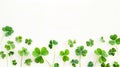 Generative AI Green four leaf clover creative layout isolated on white background Lucky clover banner border compo Royalty Free Stock Photo