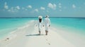 Generative AI Happy couple in white clothing and with hats walks down a tropical beach with turquoise sea in the M Royalty Free Stock Photo