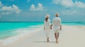 Generative AI Happy couple in white clothing and with hats walks down a tropical beach with turquoise sea in the M Royalty Free Stock Photo